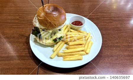 Cheeseburger with French fries Cheeseburger with French fries 140635697