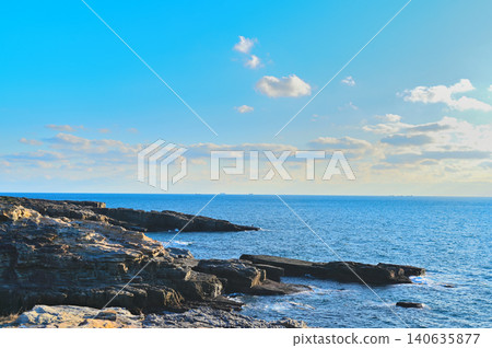 The refreshing sea breeze creates a beautiful landscape of rocky cliffs and the horizon. The refreshing sea breeze creates a beautiful landscape of rocky cliffs and the horizon. 140635877