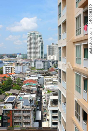 High-rise condominiums towering over the area around BTS Phra Khanong in Bangkok, Thailand, and the cityscape. High-rise condominiums towering over the area around BTS Phra Khanong in Bangkok, Thailand, and the cityscape. 140636320