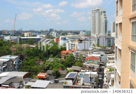 High-rise condominiums towering over the area around BTS Phra Khanong in Bangkok, Thailand, and the cityscape. High-rise condominiums towering over the area around BTS Phra Khanong in Bangkok, Thailand, and the cityscape. 140636321