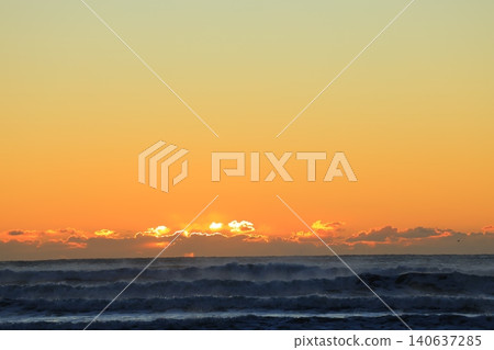 A sea stained in a morning glow 140637285