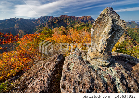 Stone Buddha statues and autumn foliage at Kannon-iwa, Kurotaki-yama, Goro-mine, and the mountains of Nishijoshu. Stone Buddha statues and autumn foliage at Kannon-iwa, Kurotaki-yama, Goro-mine, and the mountains of Nishijoshu. 140637922