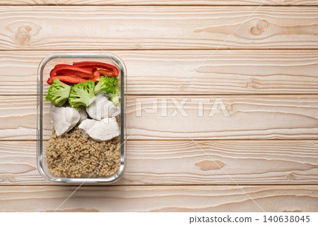 Healthy chicken quinoa meal prep container 140638045