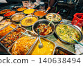 Variety of authentic Thai street food and Southern Thai curries at a local market stall 140638494
