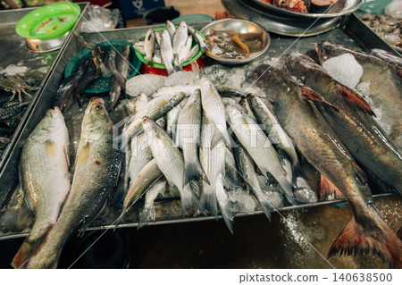 Fresh fish displayed for sale at a traditional local market in Thailand Fresh fish displayed for sale at a traditional local market in Thailand 140638500
