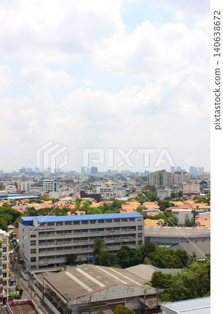 A modern condominium with a swimming pool and streetscape in the Phra Khanong district of Bangkok, Thailand. A modern condominium with a swimming pool and streetscape in the Phra Khanong district of Bangkok, Thailand. 140638672
