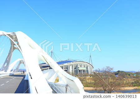 A view of Toyota Stadium and Toyota Bridge in Toyota City, Aichi Prefecture. A view of Toyota Stadium and Toyota Bridge in Toyota City, Aichi Prefecture. 140639013