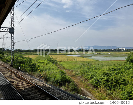 Rural scenery visible from Kintetsu Line's Hirahata Station 140640013