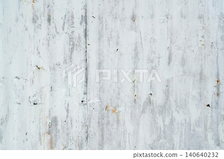 Galvanized sheet painted with white color. Empty white wall texture background. Peeling paint on white wall. Distorted striped gray galvanized sheet. Empty white and gray background for minimal life. Galvanized sheet painted with white color. Empty white wall texture background. Peeling paint on white wall. Distorted striped gray galvanized sheet. Empty white and gray background for minimal life. 140640232