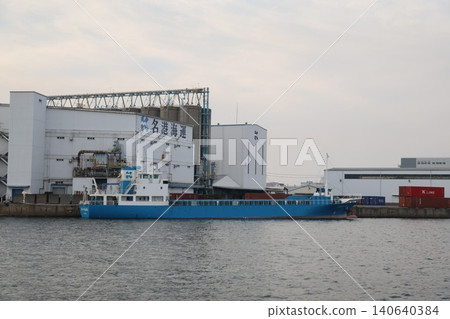 A ship leaving port on an autumn morning A ship leaving port on an autumn morning 140640384