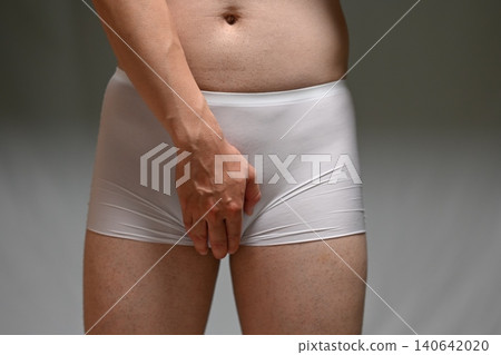 Man in white pants Man in white pants 140642020