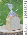 Bread in a plastic bag 140642061