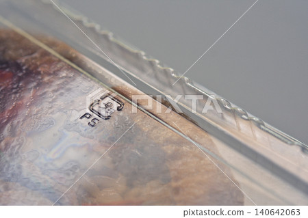 Plastic recycling symbols embossed on food packaging Plastic recycling symbols embossed on food packaging 140642063