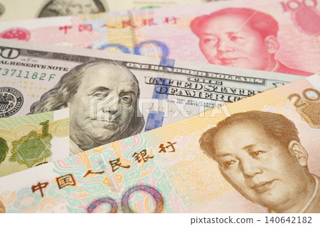 China yuan and dollar banknote money, investment economy business and banking. China yuan and dollar banknote money, investment economy business and banking. 140642182