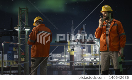 Doing radio coordination, global energy embargo and drilling rig worker. Mitigating oil crisis production disruptions, aurora borealis sky and offshore platform engineer communicating alerts, camera A Doing radio coordination, global energy embargo and drilling rig worker. Mitigating oil crisis production disruptions, aurora borealis sky and offshore platform engineer communicating alerts, camera A 140642686