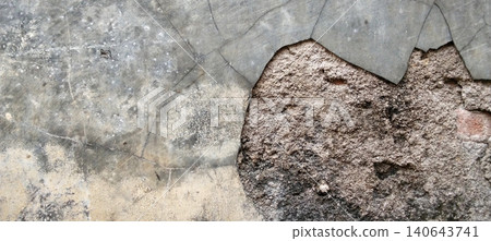 Weathered concrete walls with peeling plaster and visible brick texture. Weathered concrete walls with peeling plaster and visible brick texture. 140643741