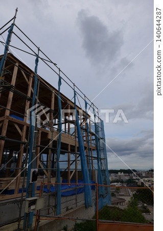 Japanese Construction Scaffolding with Safety Netting Japanese Construction Scaffolding with Safety Netting 140644287