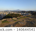 A panoramic view of Mt. Daisen, the highest peak in the Chugoku region, and the city of Yonago, as seen from the castle tower base of Yonago Castle ruins. 140644541