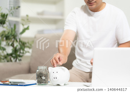 Man thinking of the concept of saving money. 140644817