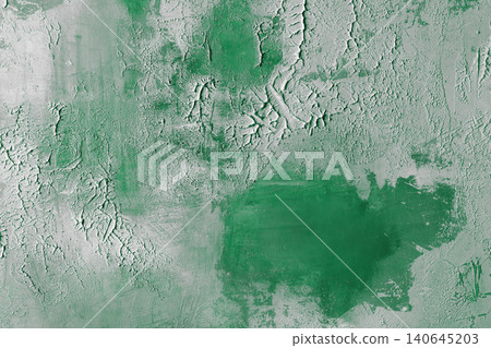 Green plaster texture with rough decorative surface, visible brush strokes and cracked relief Green plaster texture with rough decorative surface, visible brush strokes and cracked relief 140645203