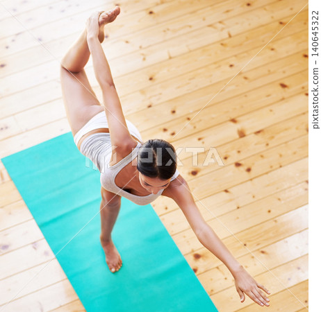 Peace, exercise and woman on yoga mat with stretching, muscle relief and body wellness from above. Zen, healthy workout and female person with dancer pose for mindfulness, balance and flexibility Peace, exercise and woman on yoga mat with stretching, muscle relief and body wellness from above. Zen, healthy workout and female person with dancer pose for mindfulness, balance and flexibility 140645322