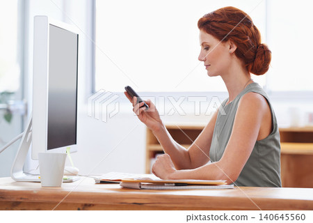 Business woman, phone and reading or typing at office desk for social media, communication or network. Professional worker, employee or person in public relations with mobile for chat and check email 140645560