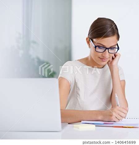Businesswoman, laptop and writing notes for planning, inspiration and schedule agenda in office. Female person, administration and online calendar for tasks, receptionist and journal for information Businesswoman, laptop and writing notes for planning, inspiration and schedule agenda in office. Female person, administration and online calendar for tasks, receptionist and journal for information 140645699
