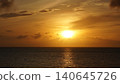 A sunrise scene that evokes a sense of taking a step towards the future. 140645726