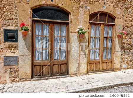 Old street in historic town of Deia in the mountains of Mallorca, Spain Old street in historic town of Deia in the mountains of Mallorca, Spain 140646351