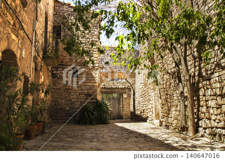 Montfalc? murallat medieval walled village alleyway Montfalc? murallat medieval walled village alleyway 140647016