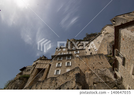 Rocamadour medieval village buildings clinging to cliffside Rocamadour medieval village buildings clinging to cliffside 140647035