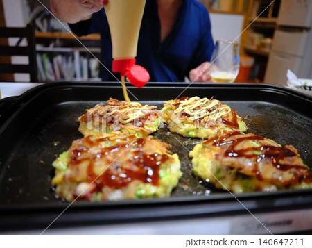 Okonomiyaki cooking kitchen Okonomiyaki cooking kitchen 140647211