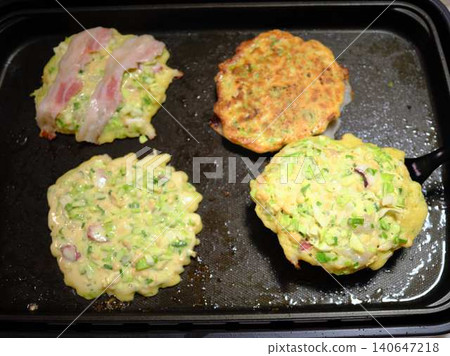 Okonomiyaki cooking kitchen 140647218