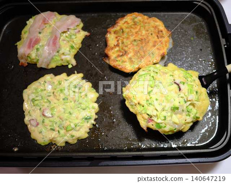 Okonomiyaki cooking kitchen 140647219