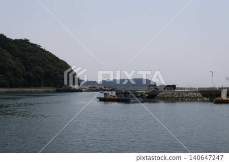 Coastal Harbor with Boats and Greenery Coastal Harbor with Boats and Greenery 140647247