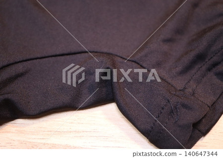 Close-up of Dark Fabric Stitching Detail Close-up of Dark Fabric Stitching Detail 140647344