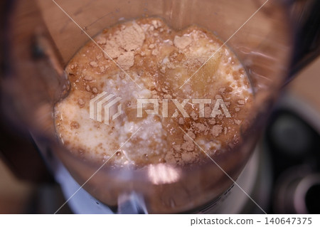 Blender with Mixed Ingredients in Progress 140647375