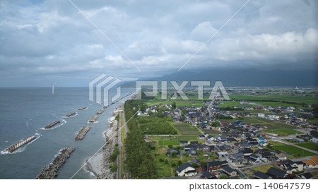 Scenes of offshore wind turbines along the Toyama Bay coast during strong winds as the rainy season begins. Scenes of offshore wind turbines along the Toyama Bay coast during strong winds as the rainy season begins. 140647579
