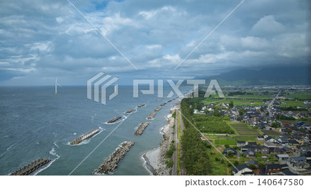 Scenes of offshore wind turbines along the Toyama Bay coast during strong winds as the rainy season begins. Scenes of offshore wind turbines along the Toyama Bay coast during strong winds as the rainy season begins. 140647580