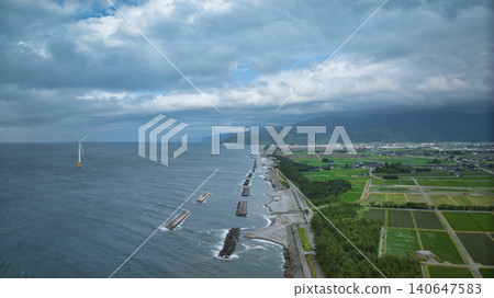 Scenes of offshore wind turbines along the Toyama Bay coast during strong winds as the rainy season begins. Scenes of offshore wind turbines along the Toyama Bay coast during strong winds as the rainy season begins. 140647583
