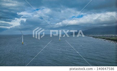 Scenes of offshore wind turbines along the Toyama Bay coast during strong winds as the rainy season begins. Scenes of offshore wind turbines along the Toyama Bay coast during strong winds as the rainy season begins. 140647586