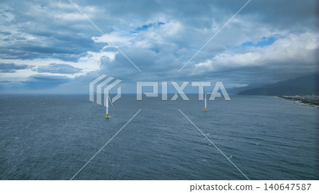 Scenes of offshore wind turbines along the Toyama Bay coast during strong winds as the rainy season begins. Scenes of offshore wind turbines along the Toyama Bay coast during strong winds as the rainy season begins. 140647587