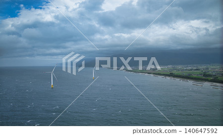 Scenes of offshore wind turbines along the Toyama Bay coast during strong winds as the rainy season begins. Scenes of offshore wind turbines along the Toyama Bay coast during strong winds as the rainy season begins. 140647592