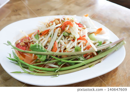spicy salad, som tam or Thai spicy salad or papaya salad or vegetable salad spicy salad, som tam or Thai spicy salad or papaya salad or vegetable salad 140647609