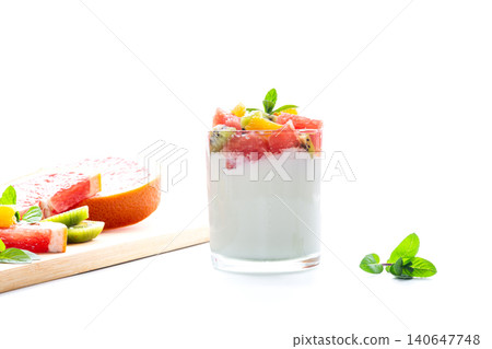 healthy yogurt dessert with kiwi orange and grapefruit on clean background 140647748