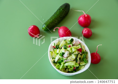 fresh homemade salad with cucumber cabbage and radish slices fresh homemade salad with cucumber cabbage and radish slices 140647751