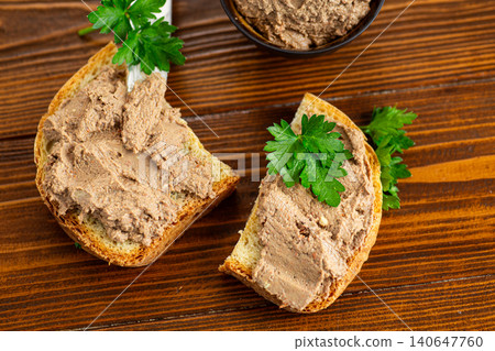 Top view of homemade pate sandwiches on brown wood Top view of homemade pate sandwiches on brown wood 140647760