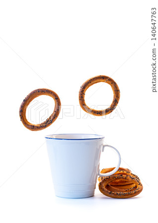 Traditional baked bagels isolated on bright background 140647763