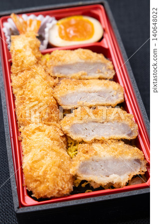 Delicious fried shrimp and pork cutlet bento box Delicious fried shrimp and pork cutlet bento box 140648022
