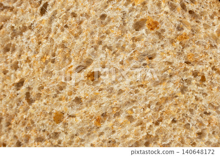 Macro texture of whole wheat bread crumb, detailed food background. 140648172